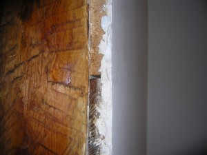 Оштукатуренная поверхность деревянной стены